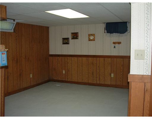 413 Meadow Mist Road Pulaski, PA 16143 - Photo 10 of 17 Family Room. Familyroom in basement with bar and wet sink.