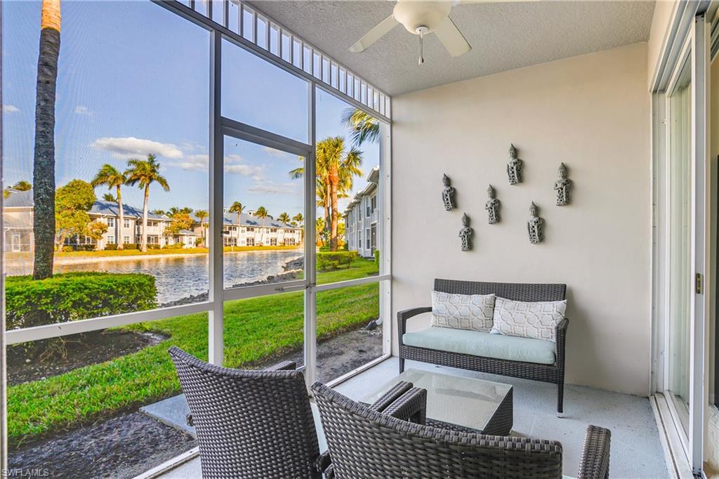 7930 Mahogany Run Lane, Unit 814 Naples, FL 34113 - Photo 20 of 33 a view of a porch with furniture and garden