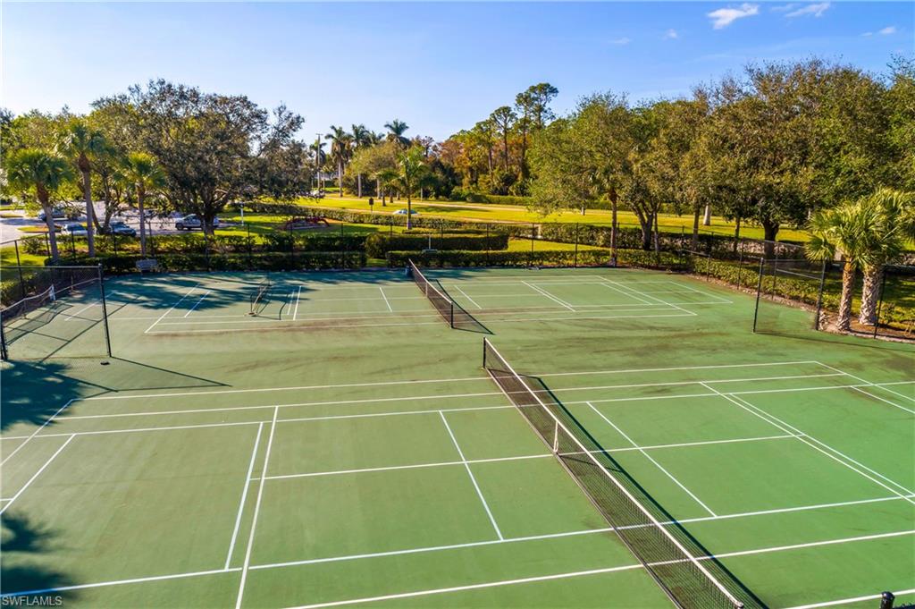 7930 Mahogany Run Lane, Unit 814 Naples, FL 34113 - Photo 29 of 33 a view of a tennis court