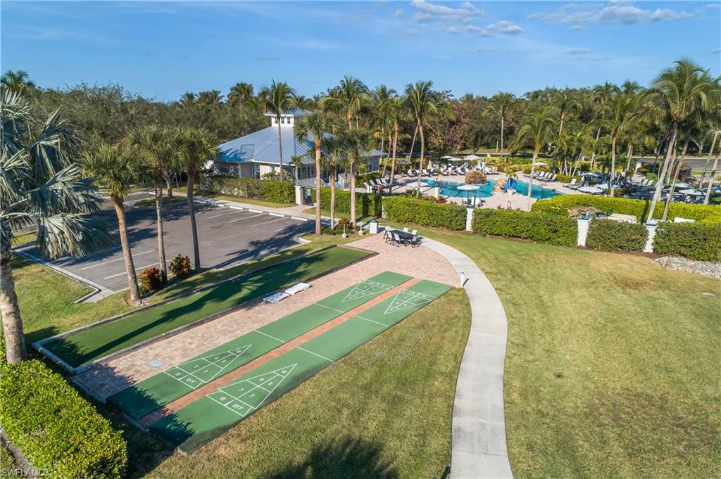 7930 Mahogany Run Lane, Unit 814 Naples, FL 34113 - Photo 32 of 33 a view of a swimming pool with a lake view