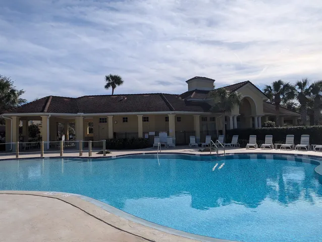 a front view of house with yard and seating space