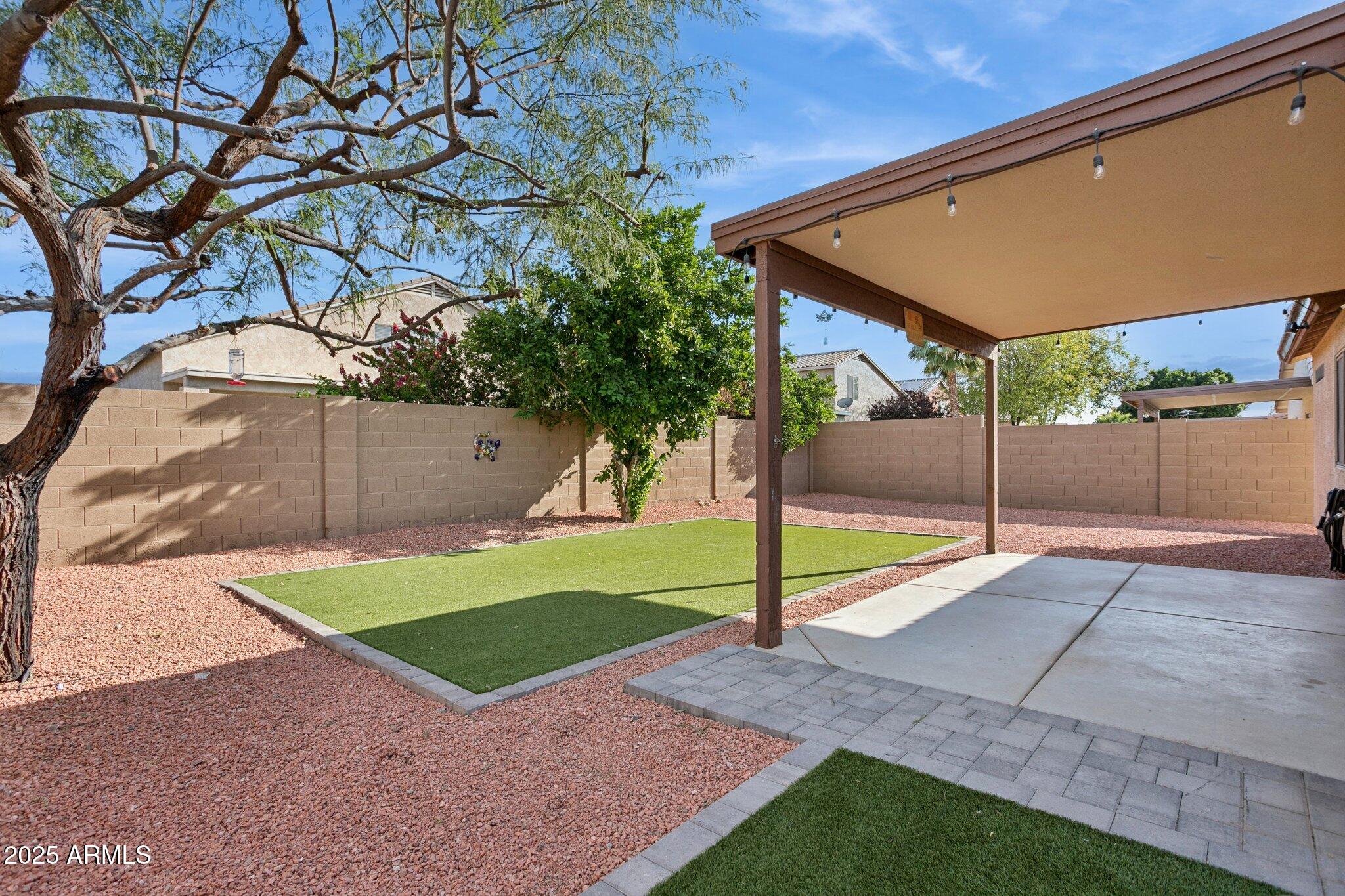 20681 North 93rd Avenue Peoria, AZ 85382 - Photo 25 of 34 Turf backyard
