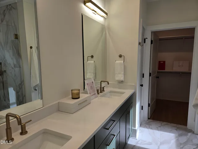 a kitchen with a sink and a stove top oven
