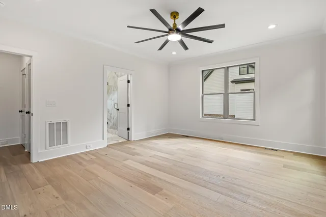 a view of an empty walk in closet