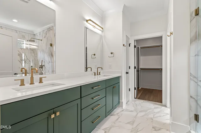 a view of room with wooden floor and entryway