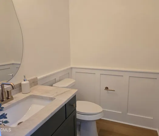 a kitchen with a sink and a stove top oven