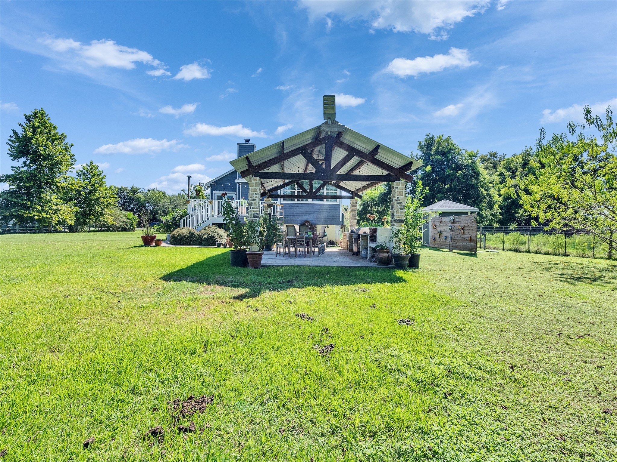 625 Pittman Road Richmond, TX 77469 - Photo 25 of 29 a front view of a house with garden