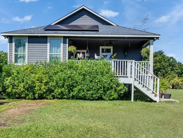 a front view of a house with porch