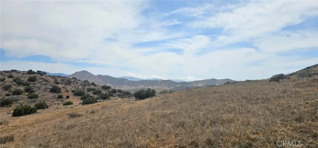 0 Sourdough Road Acton, CA 93510 - Photo 5 of 8 an aerial view of mountains in the background