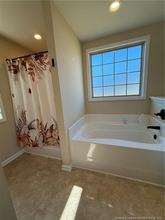 22 Raintree Lane Spring Lake, NC 28390 - Photo 21 of 25 a view of a bathtub in a room
