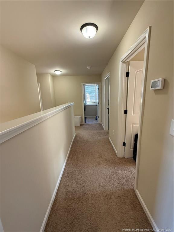 22 Raintree Lane Spring Lake, NC 28390 - Photo 22 of 25 a view of a hallway with stairs and a cabinet