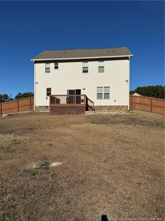 22 Raintree Lane Spring Lake, NC 28390 - Photo 25 of 25 a view of a house with backyard