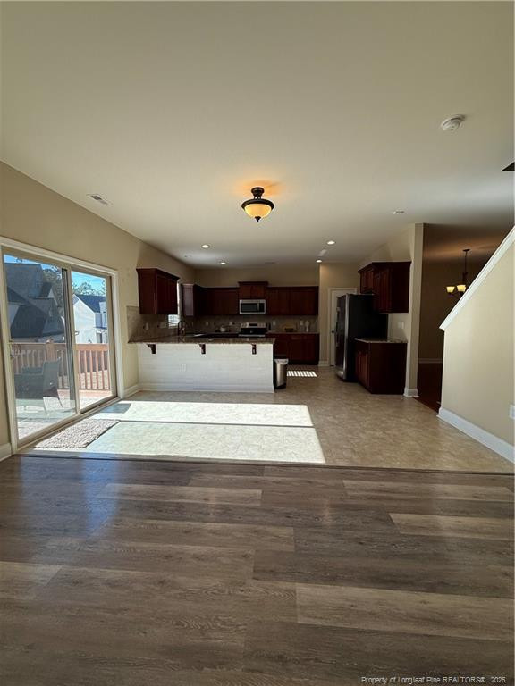 22 Raintree Lane Spring Lake, NC 28390 - Photo 9 of 25 a view of kitchen with furniture and counter space