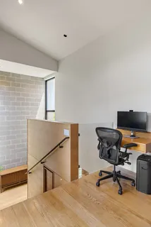 a kitchen with stove and cabinets