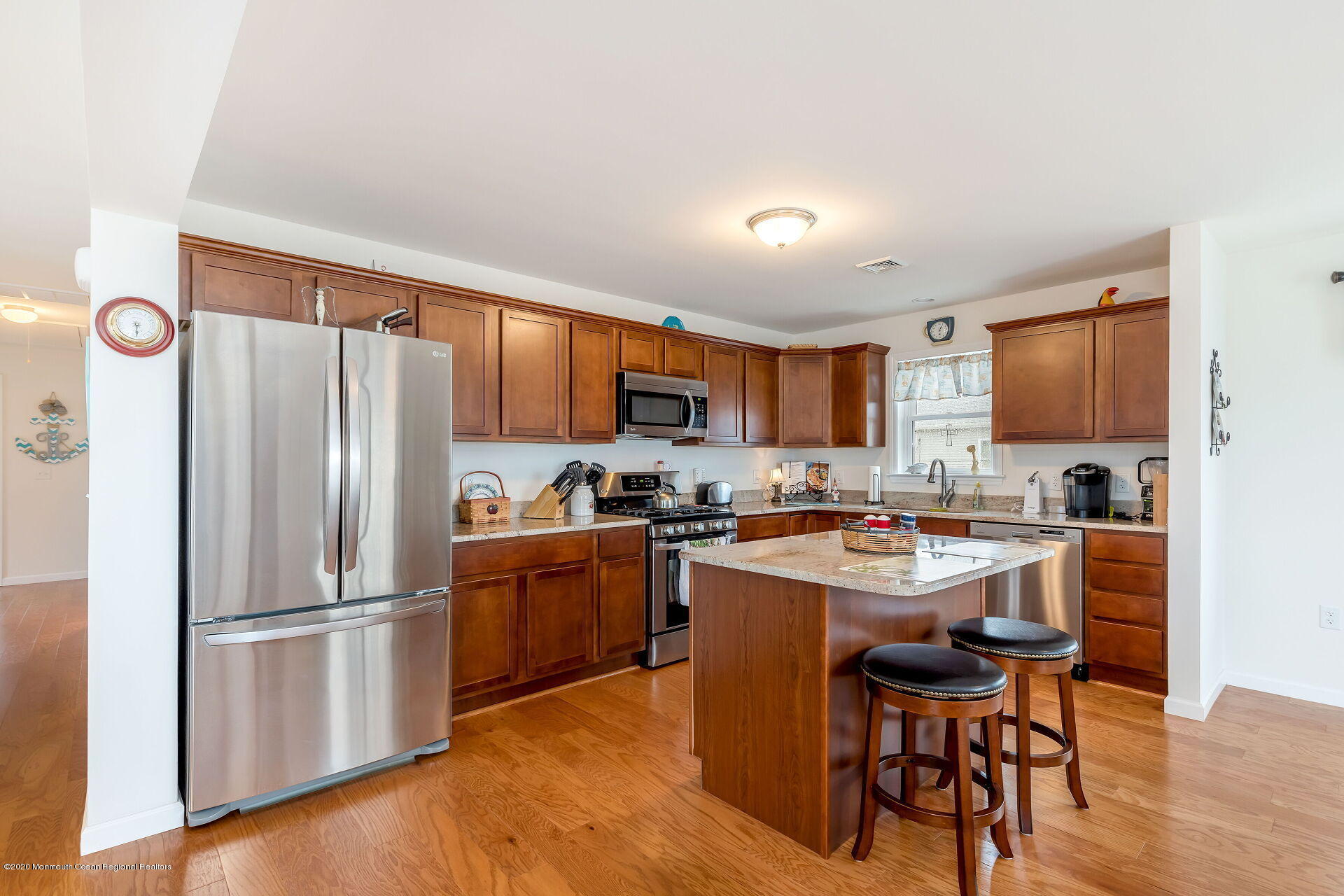 139 Flamingo Road Tuckerton, NJ 08087 - Photo 4 of 22 a kitchen with stainless steel appliances a refrigerator stove microwave and sink