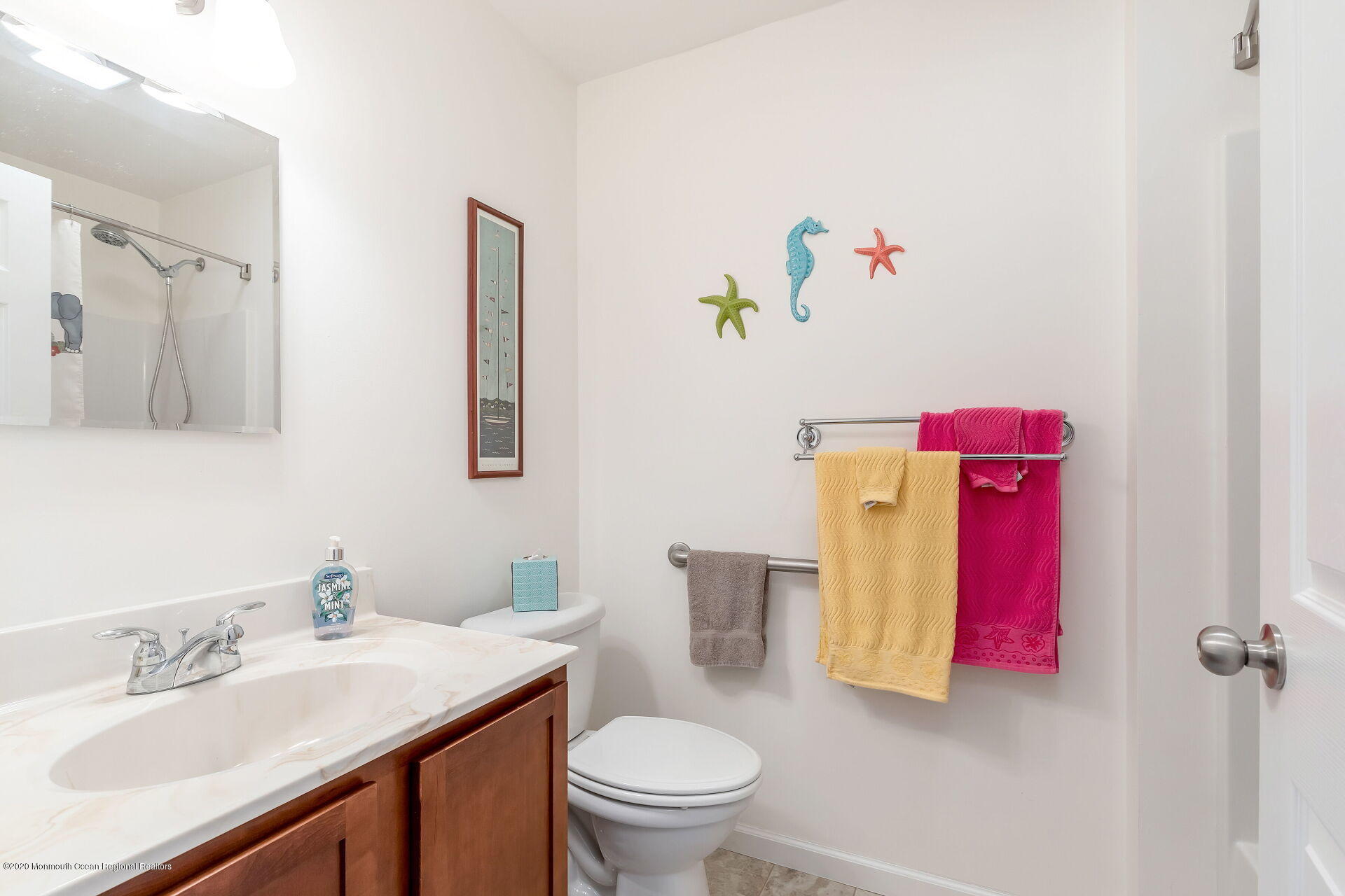 139 Flamingo Road Tuckerton, NJ 08087 - Photo 8 of 22 a bathroom with a sink vanity mirror and toilet