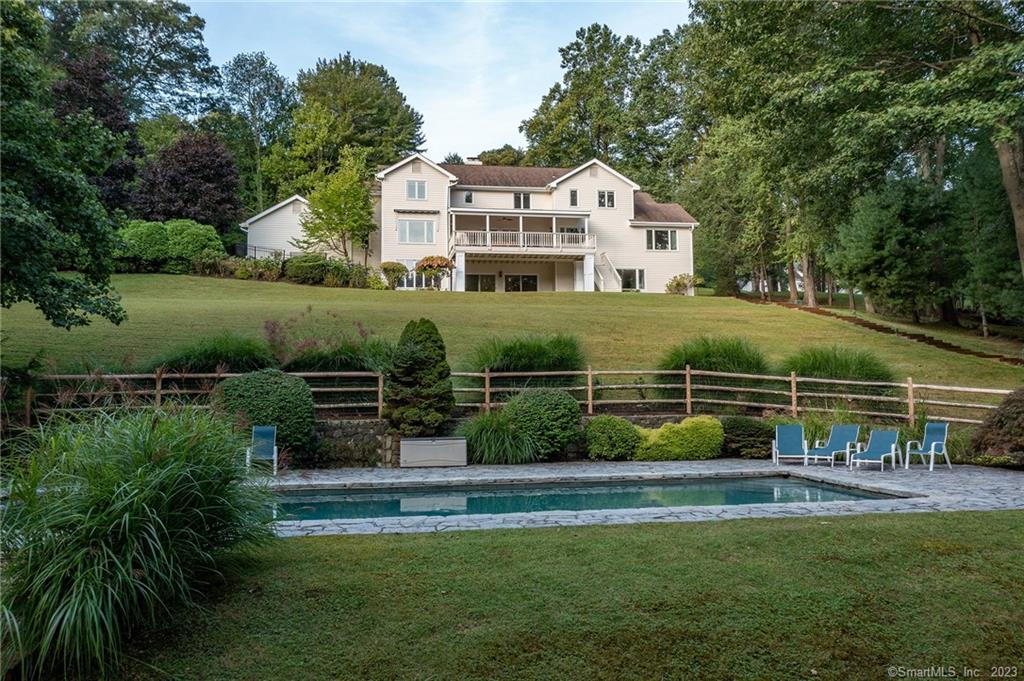 5 Sail Harbour Drive Sherman, CT 06784 - Photo 1 of 1 a front view of a house with a garden