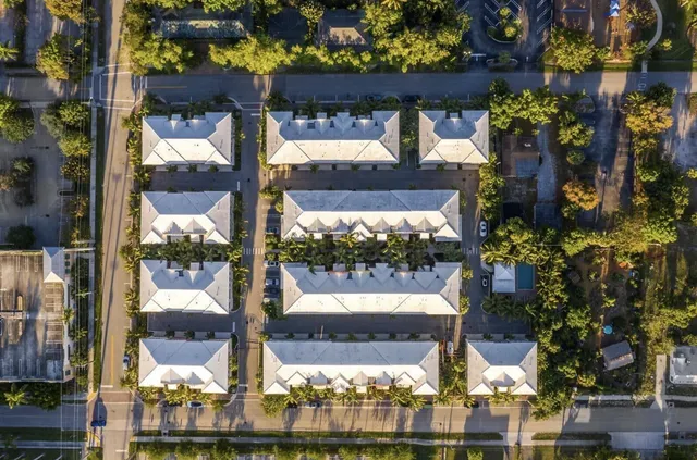 a view of a street with cars