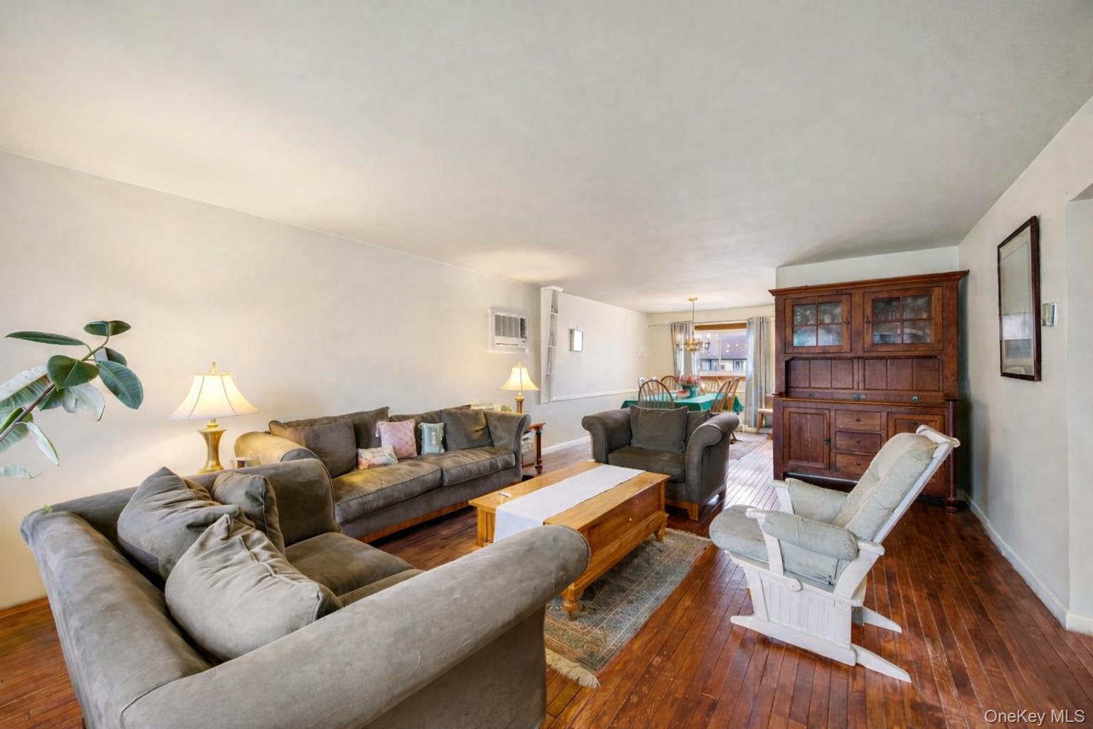 7 North Terrace Place Valley Stream, NY 11580 - Photo 12 of 40 a living room with furniture and wooden floor