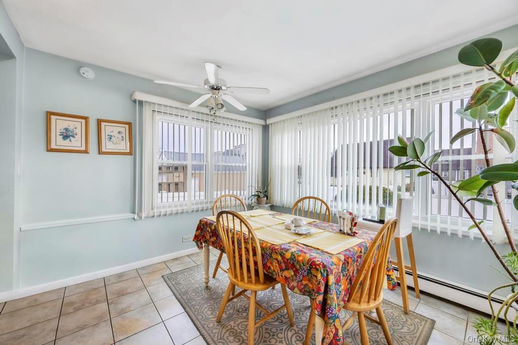 7 North Terrace Place Valley Stream, NY 11580 - Photo 19 of 40 a view of a dining room with furniture window and outside view
