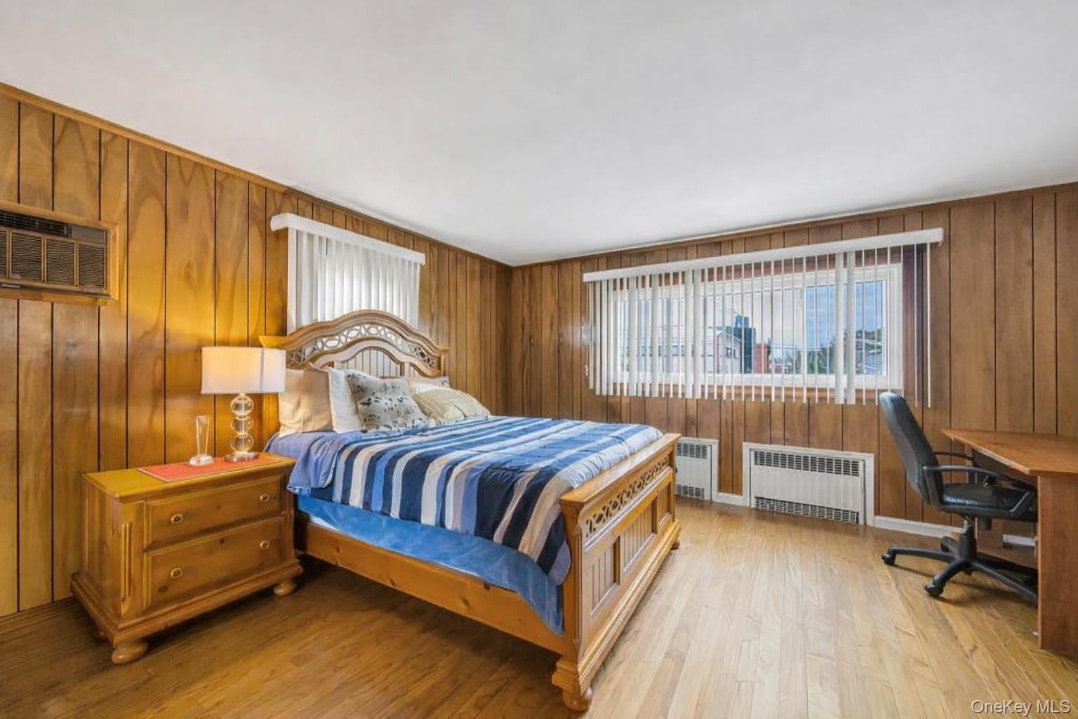 7 North Terrace Place Valley Stream, NY 11580 - Photo 23 of 40 a bedroom with a bed and a window