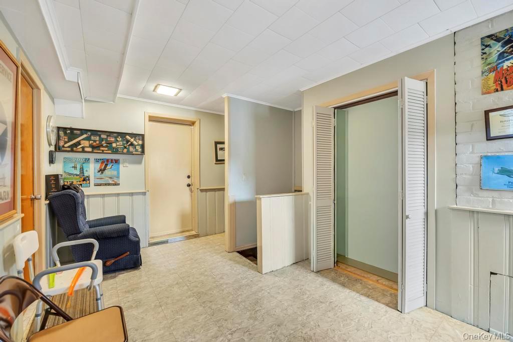 7 North Terrace Place Valley Stream, NY 11580 - Photo 30 of 40 a view of a livingroom with furniture and storage