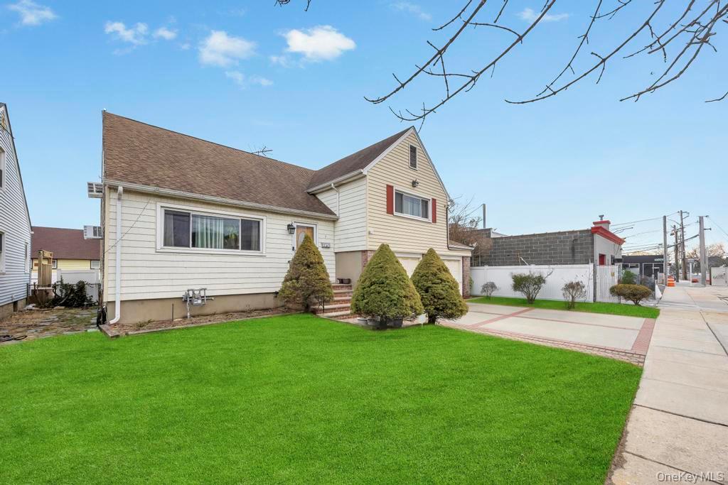 7 North Terrace Place Valley Stream, NY 11580 - Photo 3 of 40 a house view with a garden space