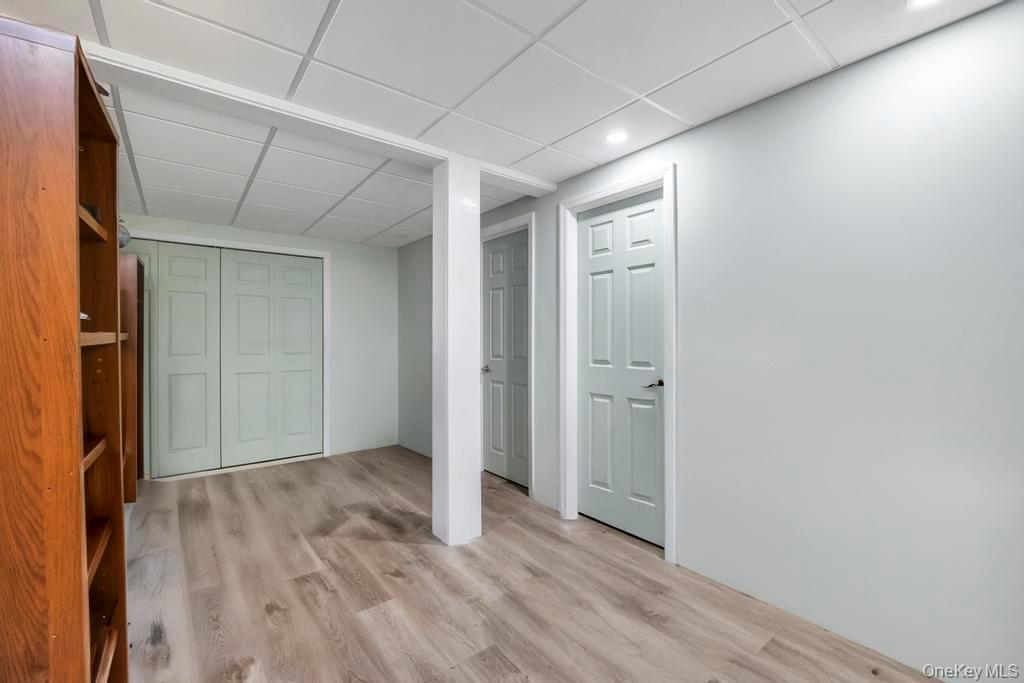 7 North Terrace Place Valley Stream, NY 11580 - Photo 32 of 40 a view of empty room with wooden floor