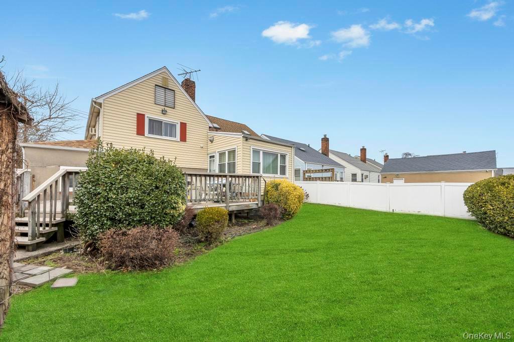 7 North Terrace Place Valley Stream, NY 11580 - Photo 6 of 40 a view of a house with a yard and sitting area