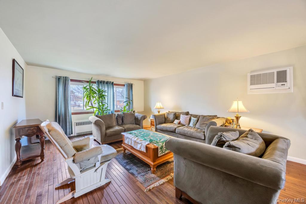 7 North Terrace Place Valley Stream, NY 11580 - Photo 9 of 40 a living room with furniture and a window