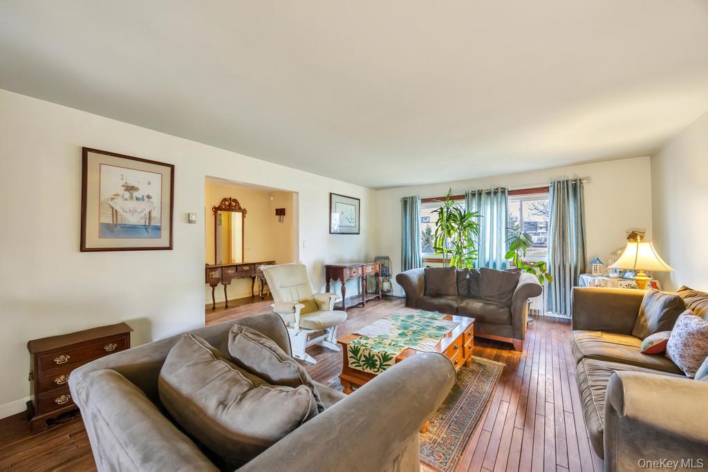 7 North Terrace Place Valley Stream, NY 11580 - Photo 10 of 40 a living room with furniture and a window