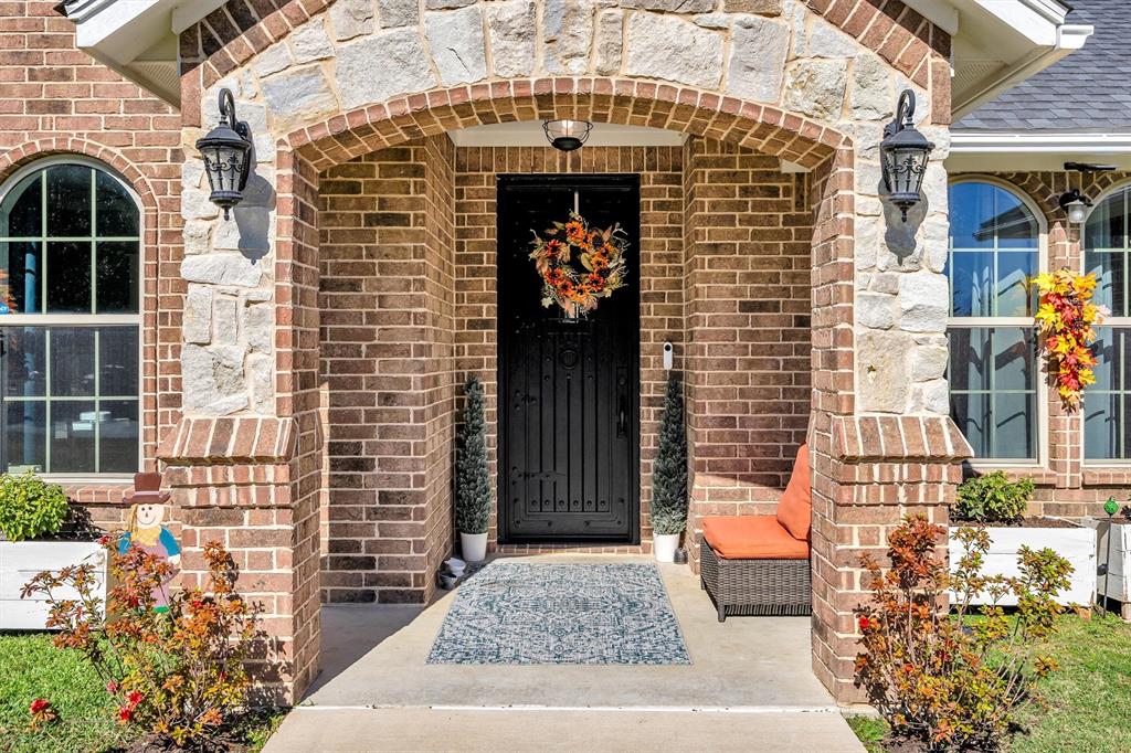 300 West Bell Street Everman, TX 76140 - Photo 18 of 28 a front view of a house