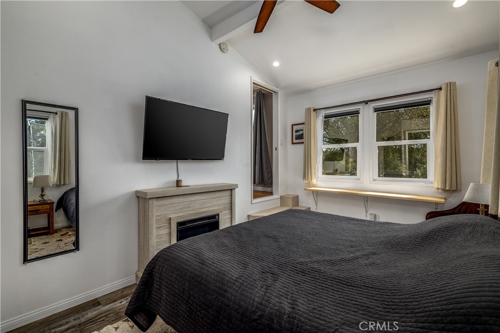 155 Barhaven Lane Fallbrook, CA 92028 - Photo 18 of 43 a bedroom with a bed and a flat screen tv
