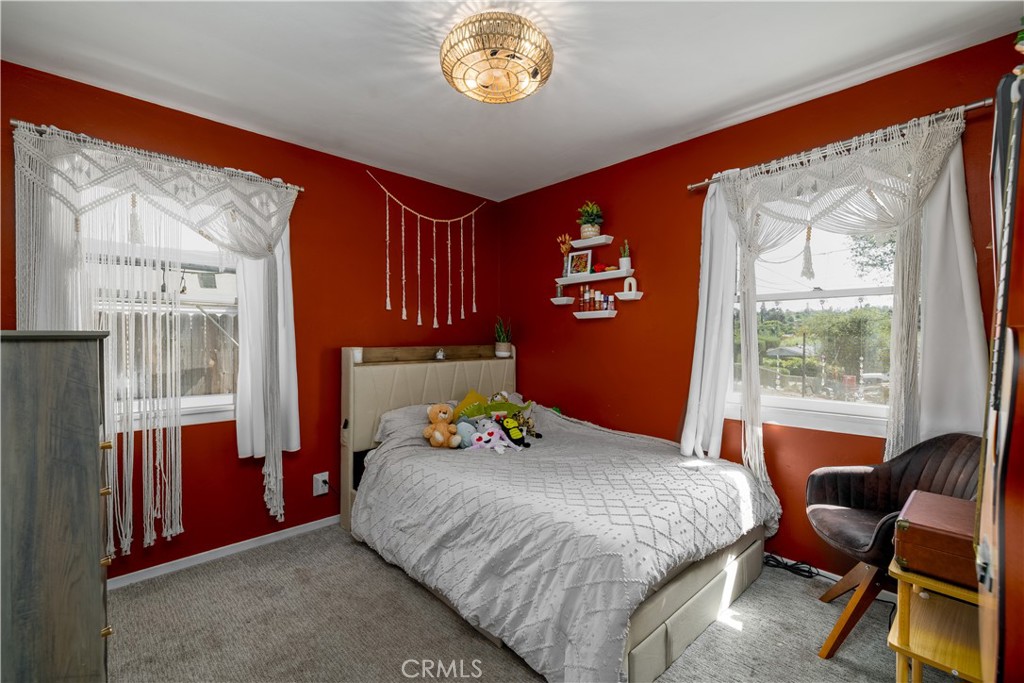 155 Barhaven Lane Fallbrook, CA 92028 - Photo 22 of 43 a bedroom with a bed and a window