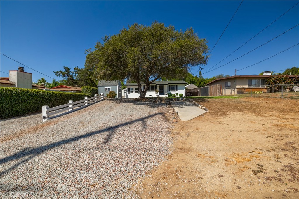 155 Barhaven Lane Fallbrook, CA 92028 - Photo 36 of 43 a view of a yard with a house
