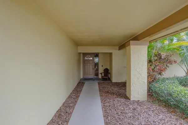a view of a room with a large window