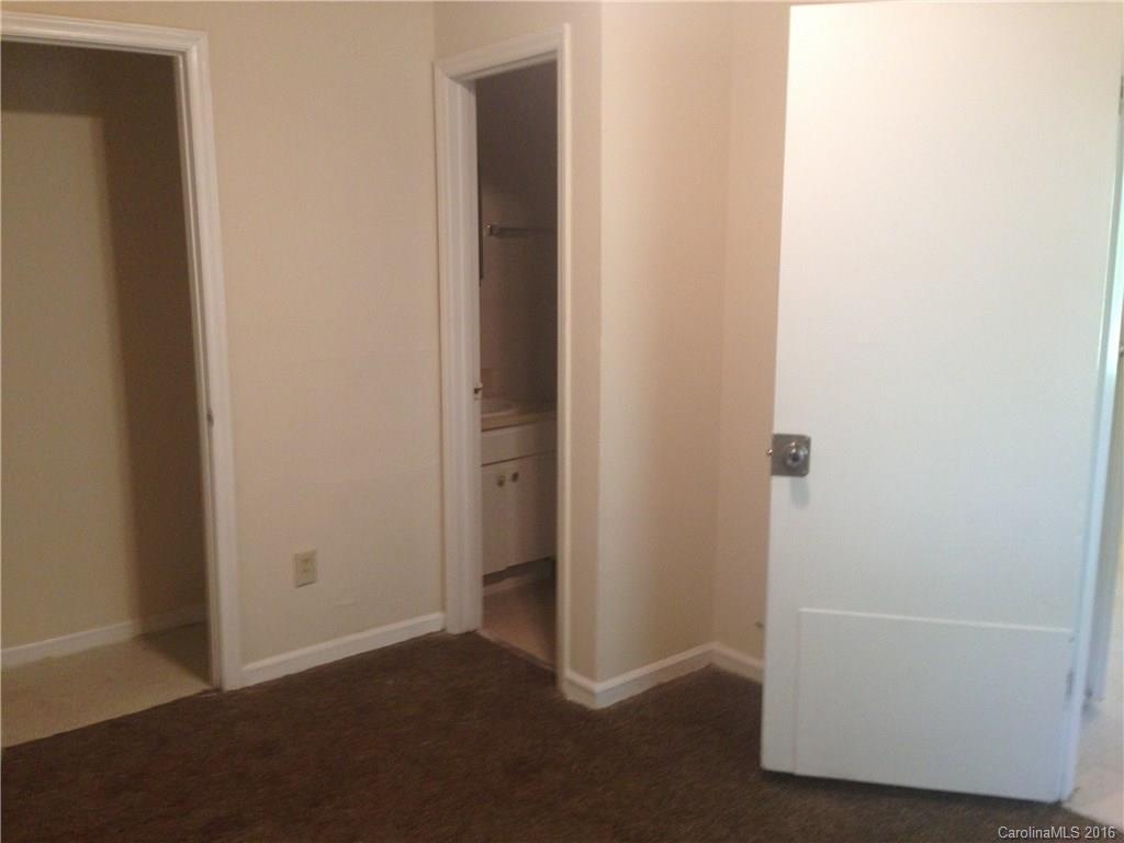 713 Castle Road, Unit B Monroe, NC 28110 - Photo 3 of 5 a view of an empty room