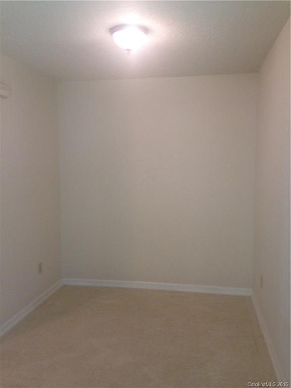 713 Castle Road, Unit B Monroe, NC 28110 - Photo 4 of 5 a view of an empty room