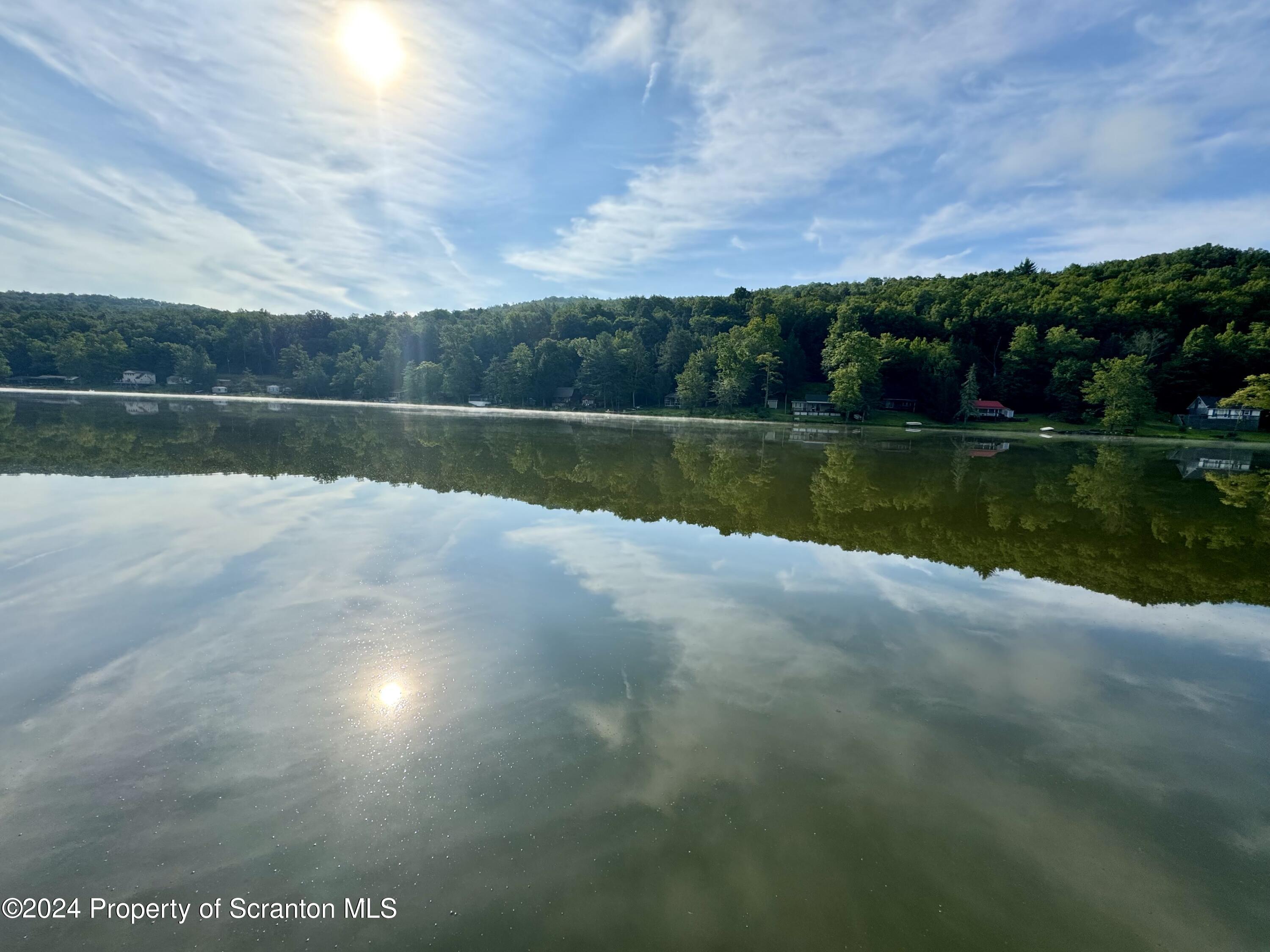 266 Crescent Lake Road Meshoppen, PA 18630 - Photo 11 of 12 a view of a lake