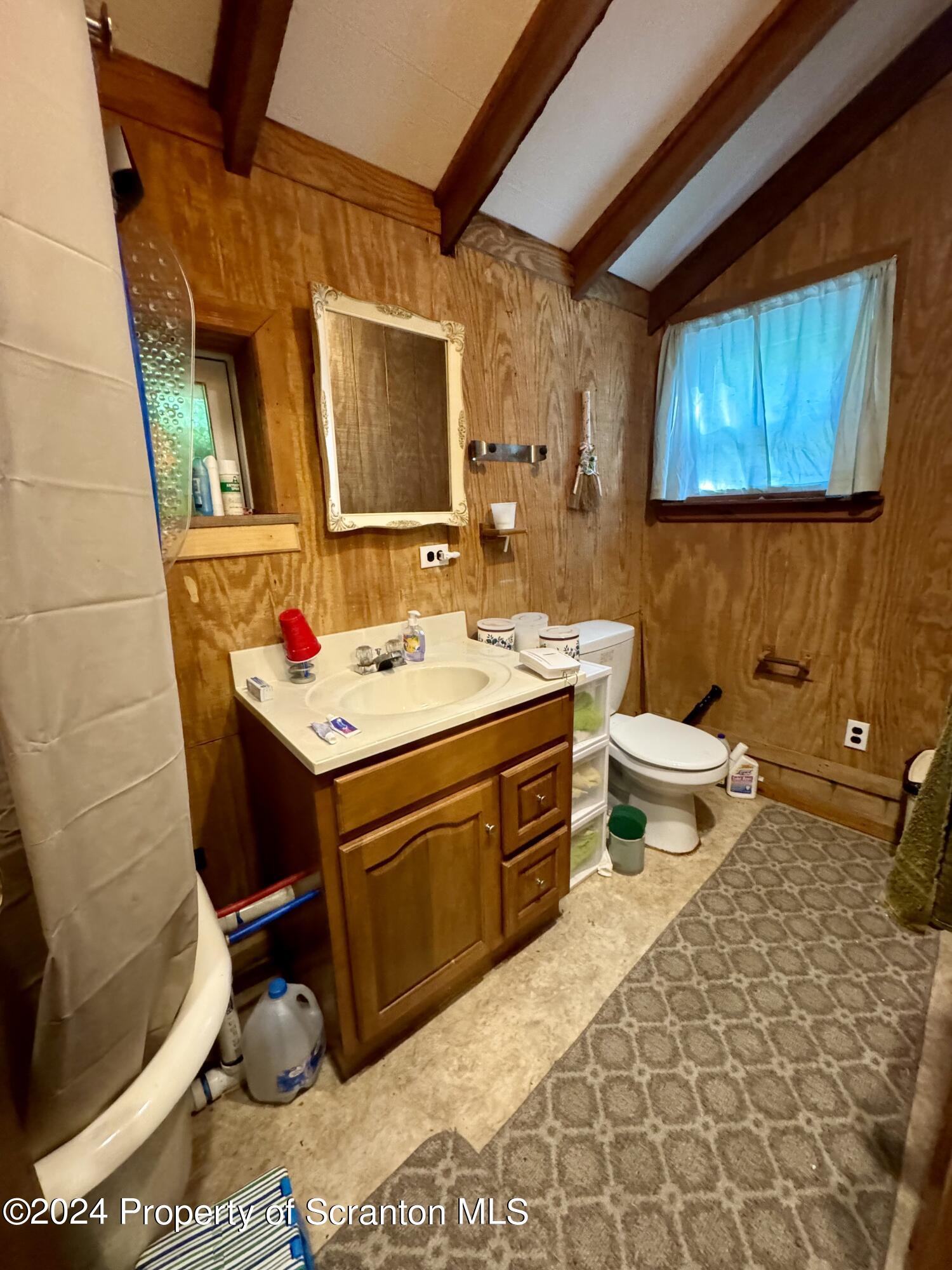 266 Crescent Lake Road Meshoppen, PA 18630 - Photo 9 of 12 a bathroom with a sink and a mirror