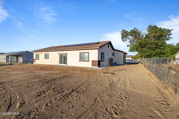 a house view with a outdoor space