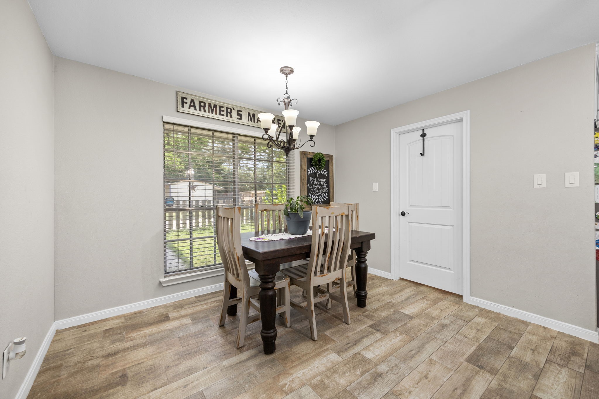 3311 Eula Morgan Road Katy, TX 77493 - Photo 13 of 32 a view of a dining room with furniture and chandelier