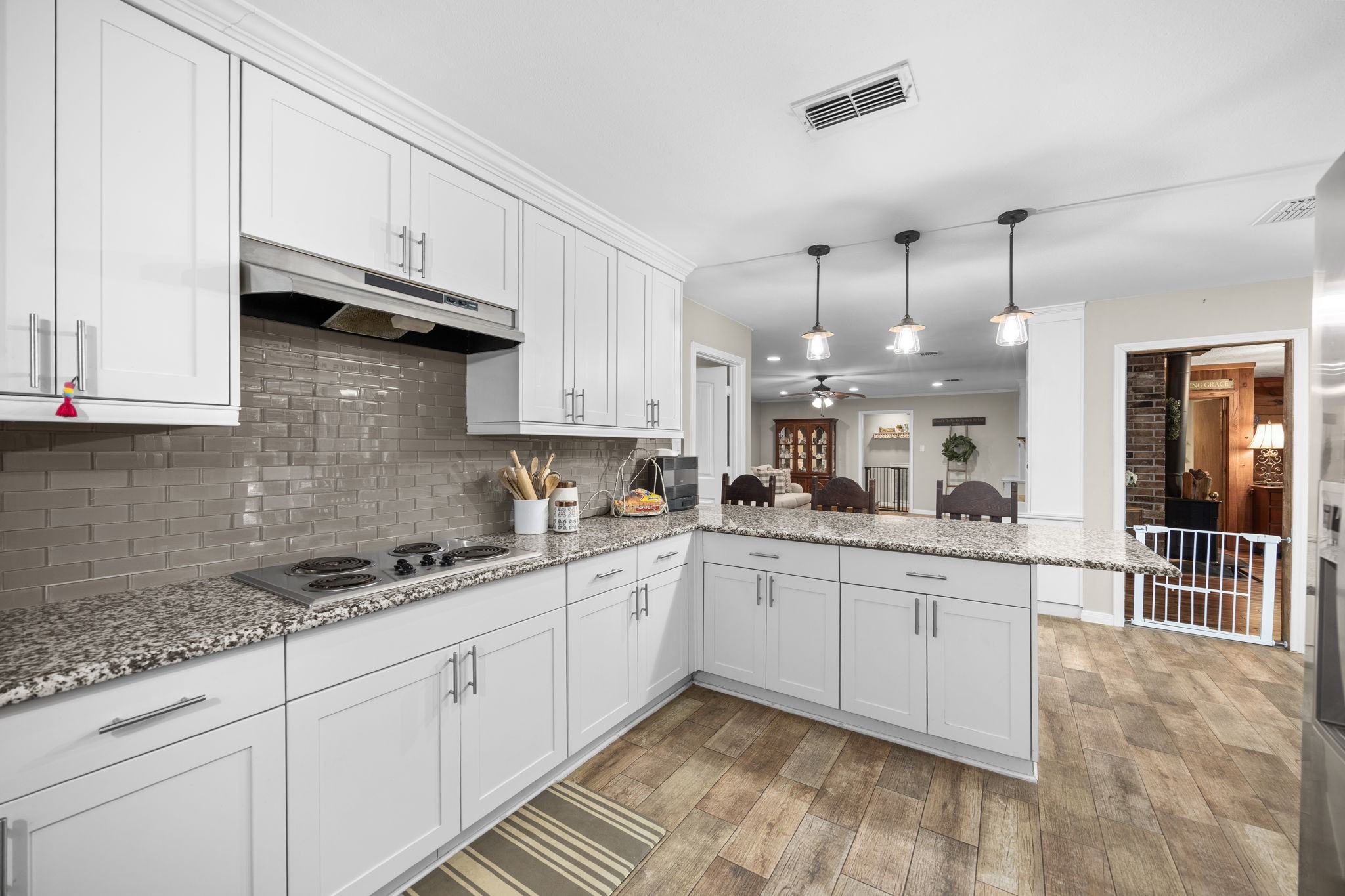 3311 Eula Morgan Road Katy, TX 77493 - Photo 17 of 32 a kitchen with sink cabinets and window