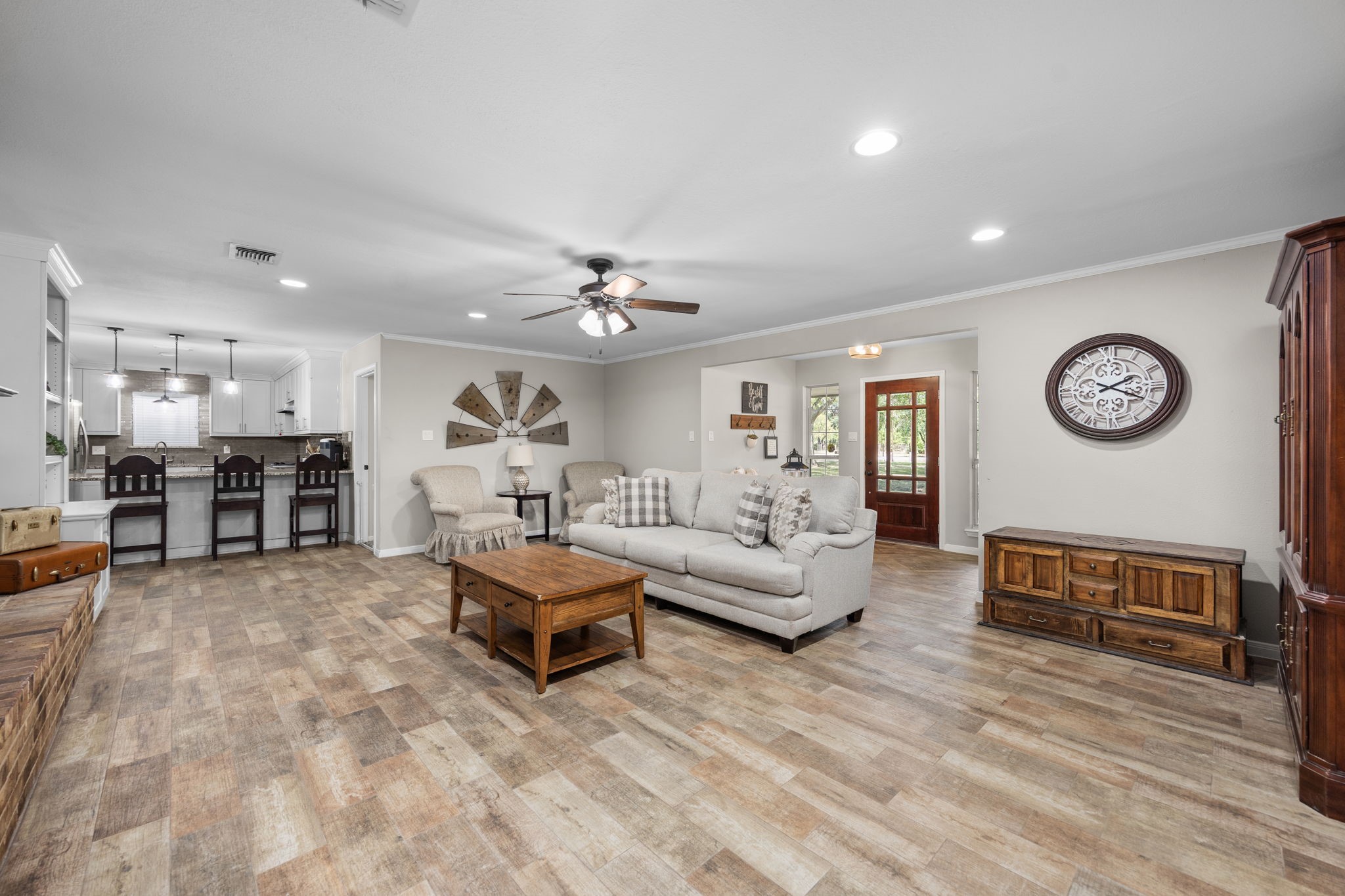 3311 Eula Morgan Road Katy, TX 77493 - Photo 10 of 32 a living room with furniture and a wooden floor