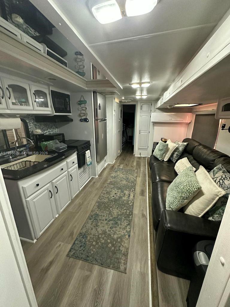 325 Calusa, Unit 9 Key Largo, FL 33037 - Photo 5 of 11 a living room with furniture