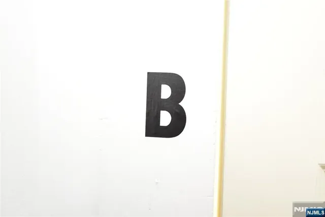 a view of a refrigerator in kitchen