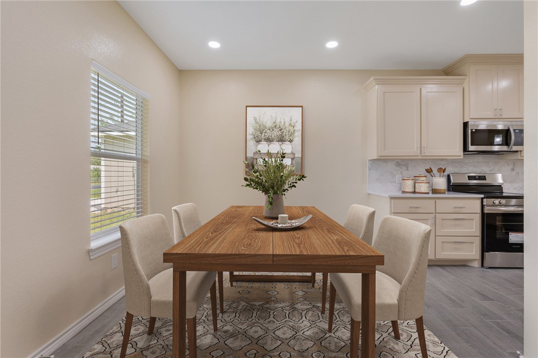 1108 Richard Street, Unit A Bryan, TX 77803 - Photo 8 of 22 Dining room featuring light wood-type flooring and recessed lighting