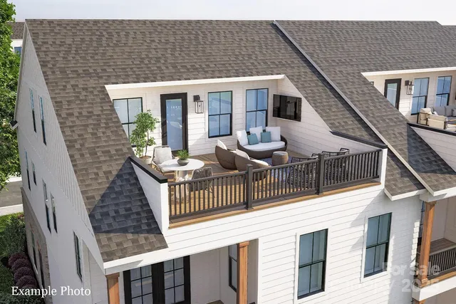 a view of a house with a deck