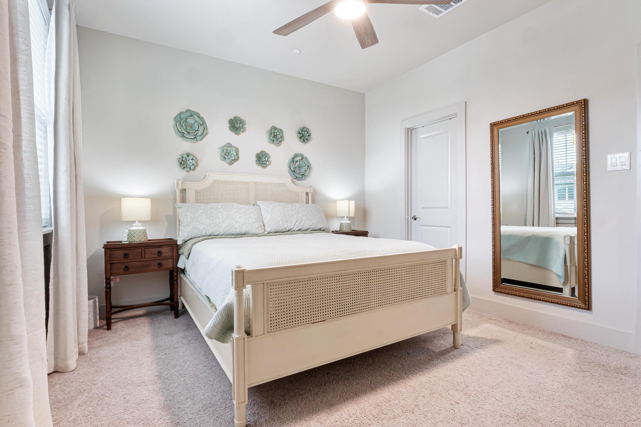 2301 Local Rebel Street Leander, TX 78641 - Photo 16 of 21 a bed room with a bed and a mirror