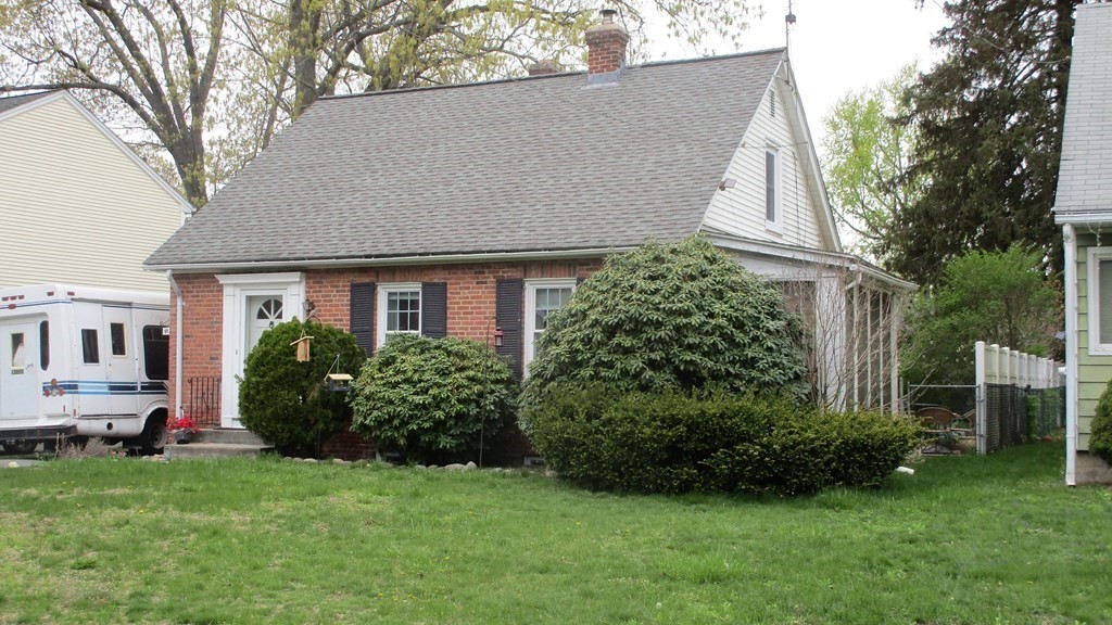45 Upton Street Springfield, MA 01104 - Photo 1 of 19 a house view with a garden space